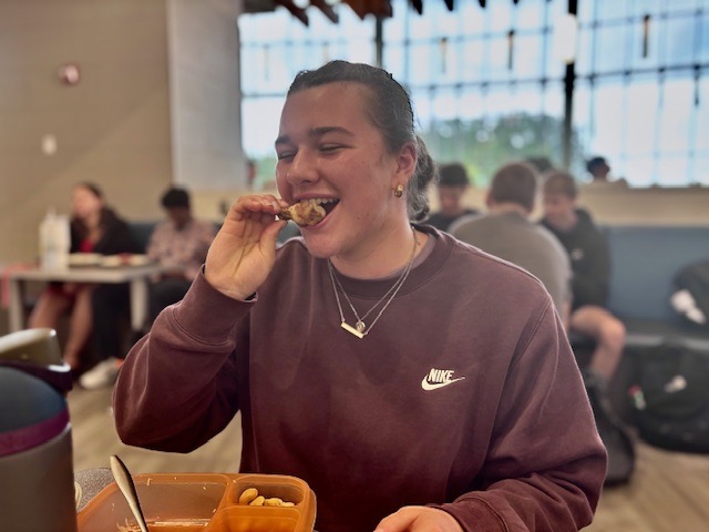 Grace Connolly relishes in the Friday lunch—dry rub chicken wings
